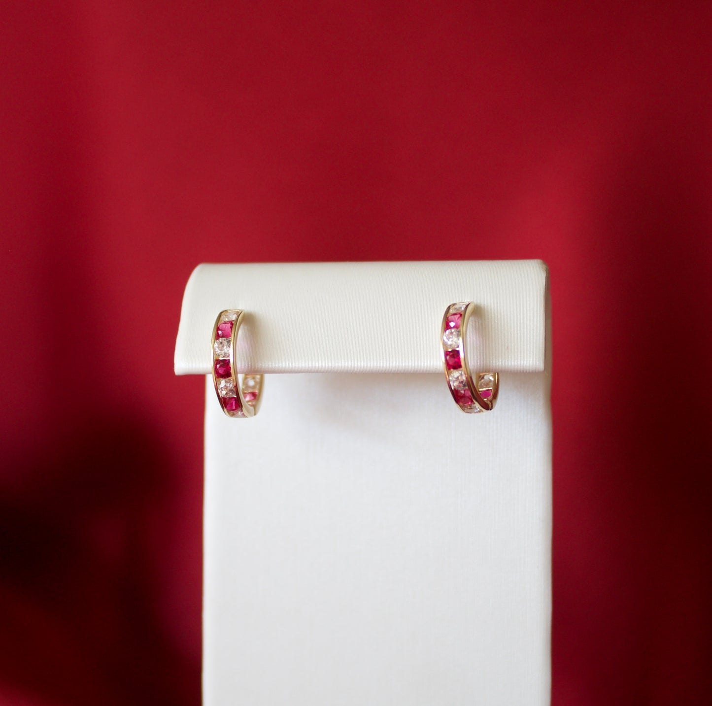 14K Gold pink and white CZ stoned huggie earrings